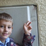 Liam finding his name on a Monaco toilet wall.